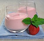 Strawberry yogurt red dyed with Carmine.